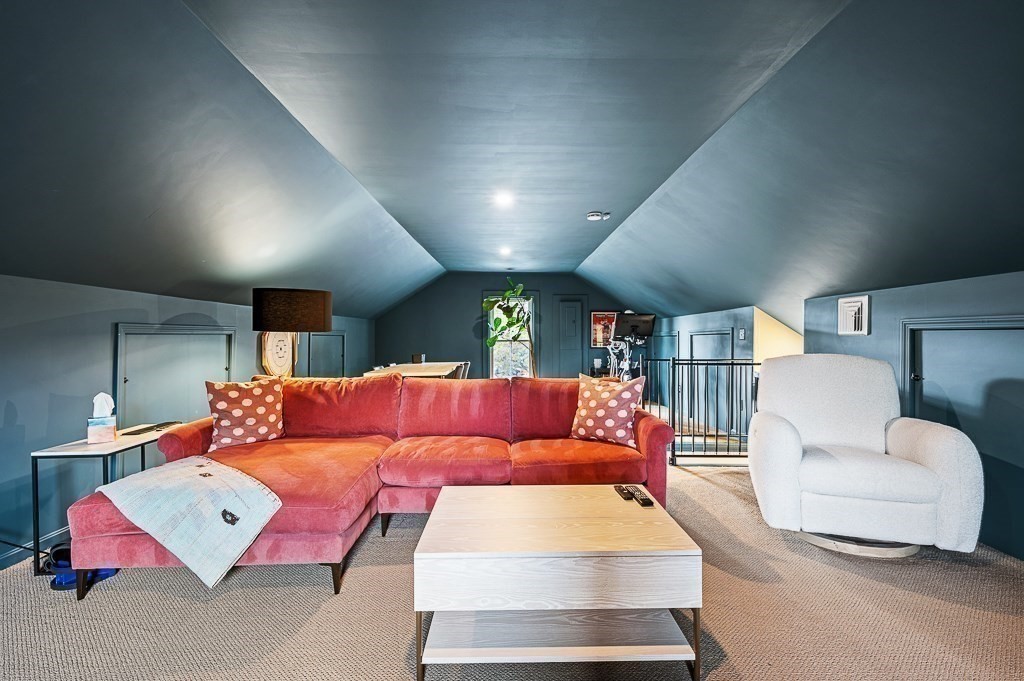 13 Blackstone Street Mendon, MA 01756 - Photo 33 of 41 a living room with furniture a rug and white walls