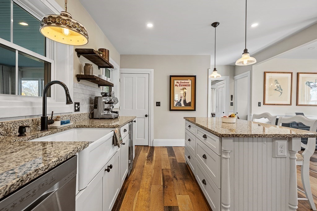 13 Blackstone Street Mendon, MA 01756 - Photo 7 of 41 a large kitchen with granite countertop a sink dishwasher a stove and a wooden floor
