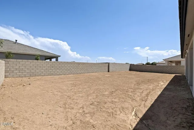 a view of swimming pool and mountain in back