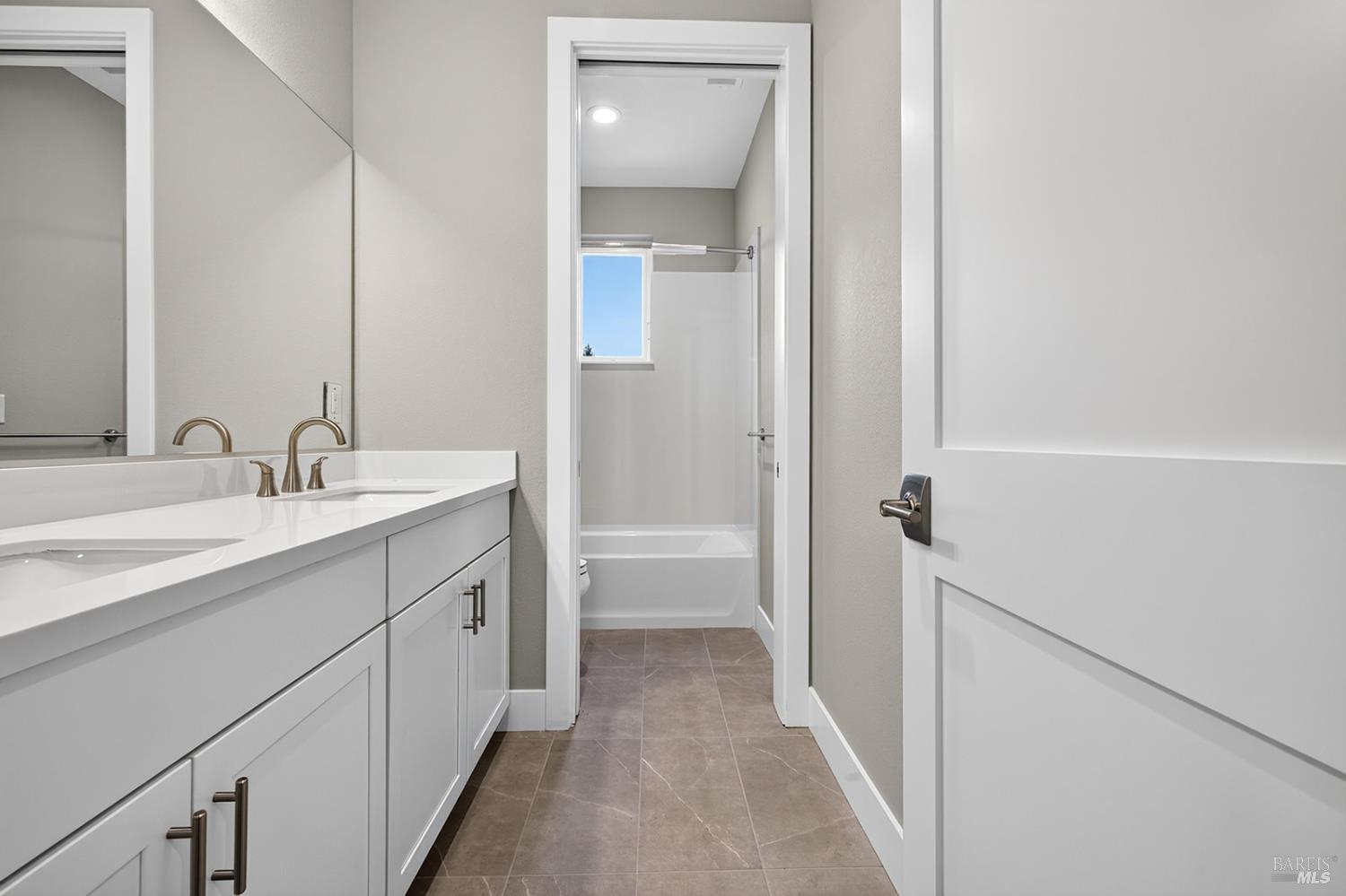 1913 Carlile Place Santa Rosa, CA 95403 - Photo 42 of 60 Here is the additional bathroom on the upper level located next to the two secondary bedrooms and media / bonus room.