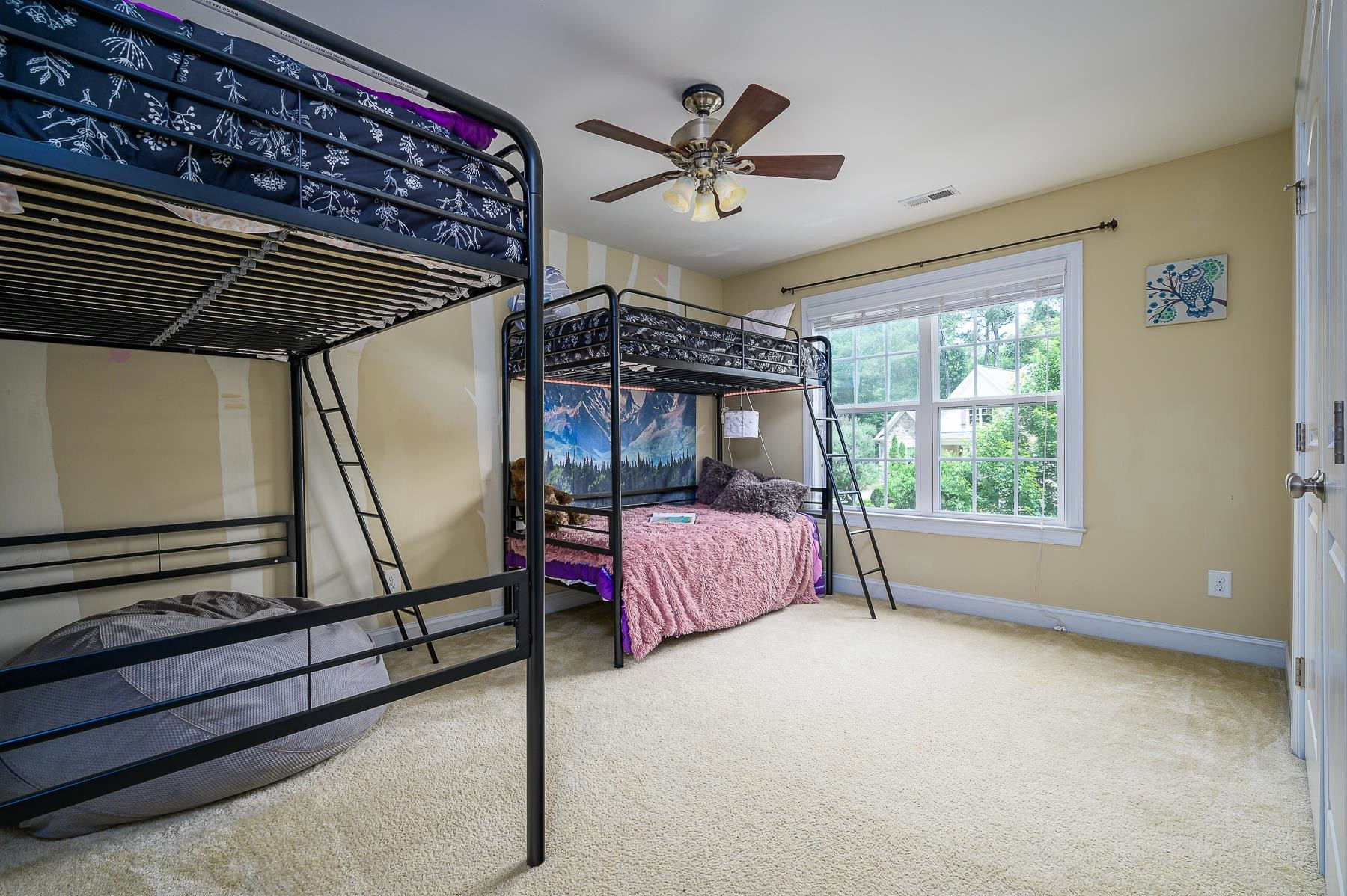 413 Mickey Lane Cary, NC 27513 - Photo 27 of 35 a bed room with a bed and a window