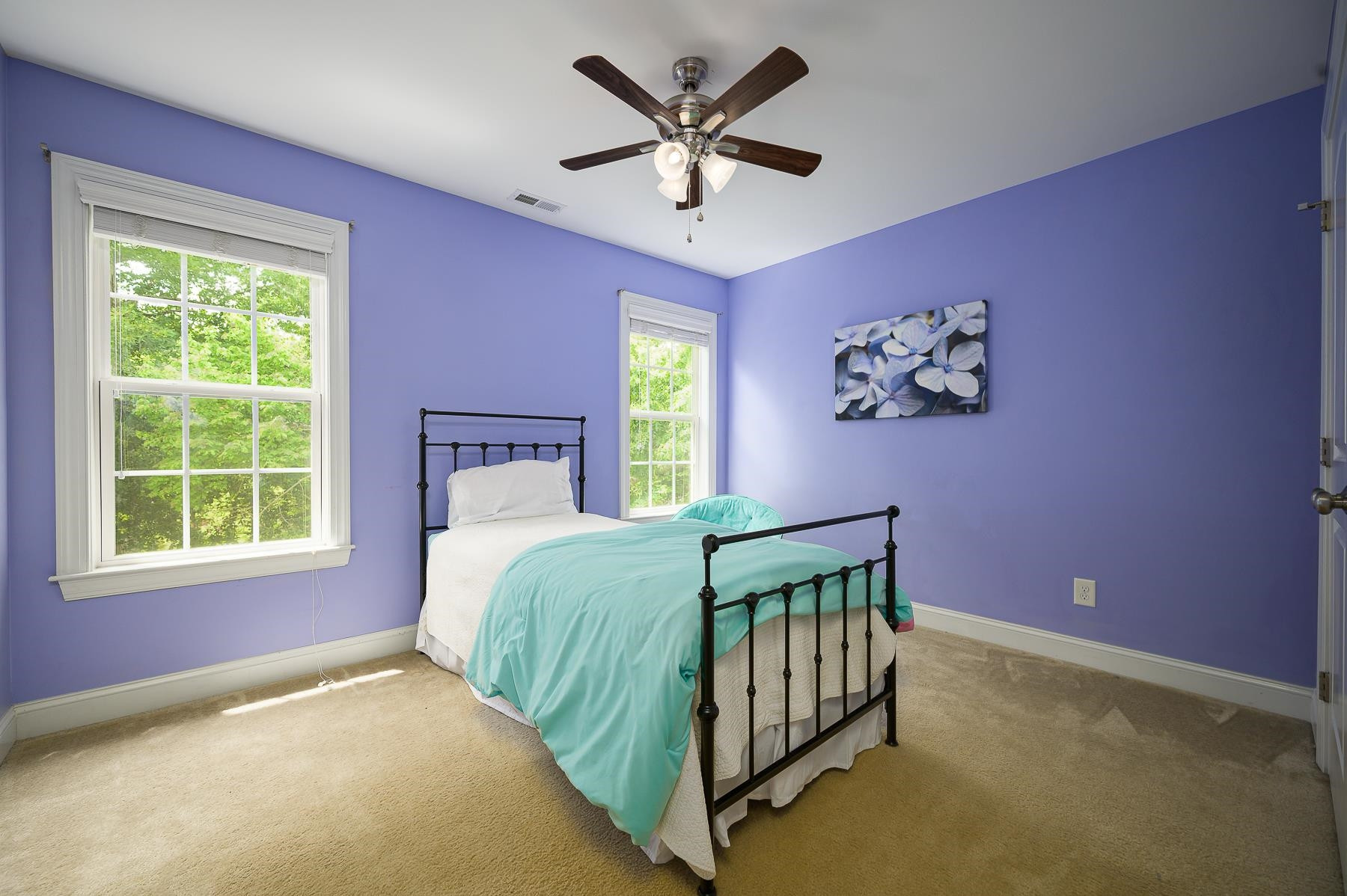 413 Mickey Lane Cary, NC 27513 - Photo 28 of 35 a bedroom with a bed and a window