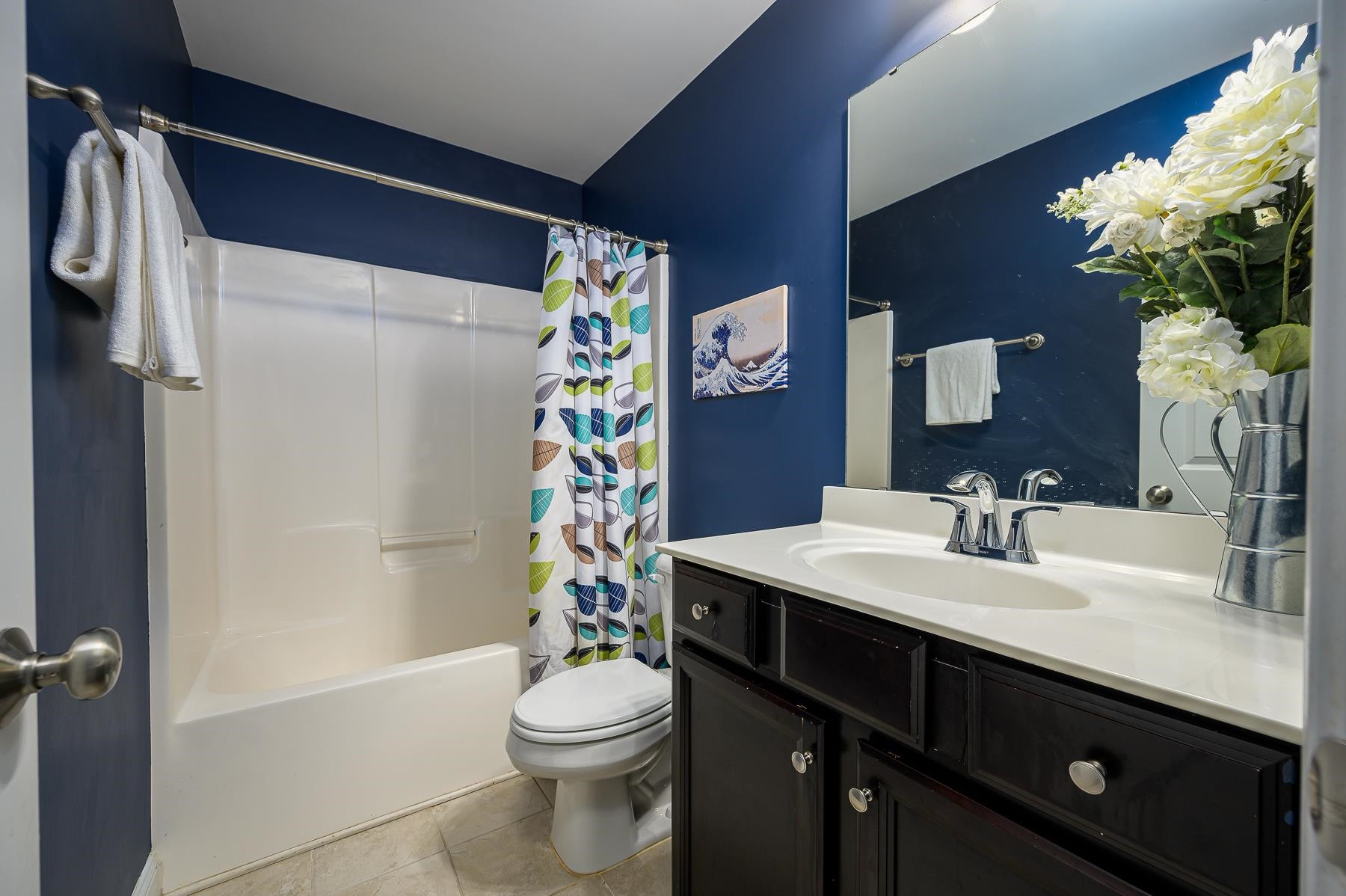 413 Mickey Lane Cary, NC 27513 - Photo 30 of 35 a bathroom with a sink toilet and shower