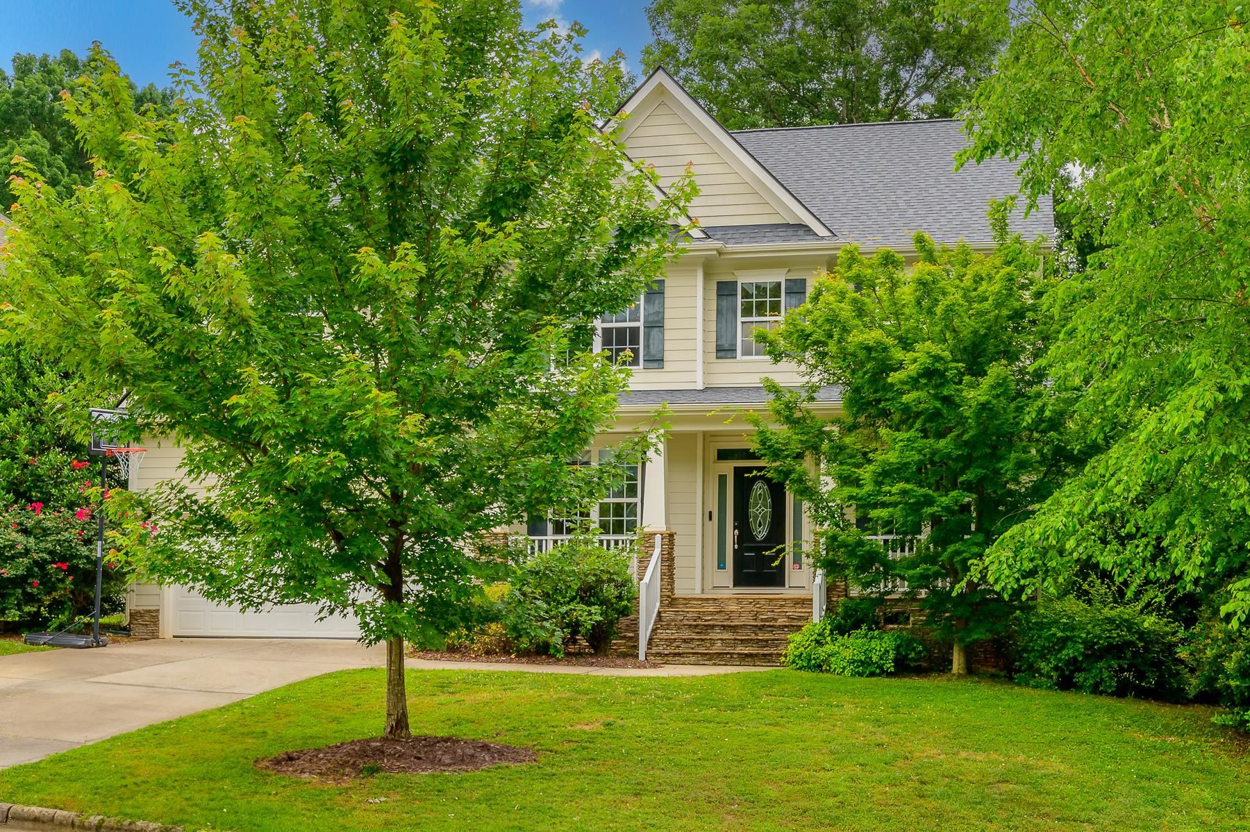 413 Mickey Lane Cary, NC 27513 - Photo 3 of 35 a front view of house with yard and green space
