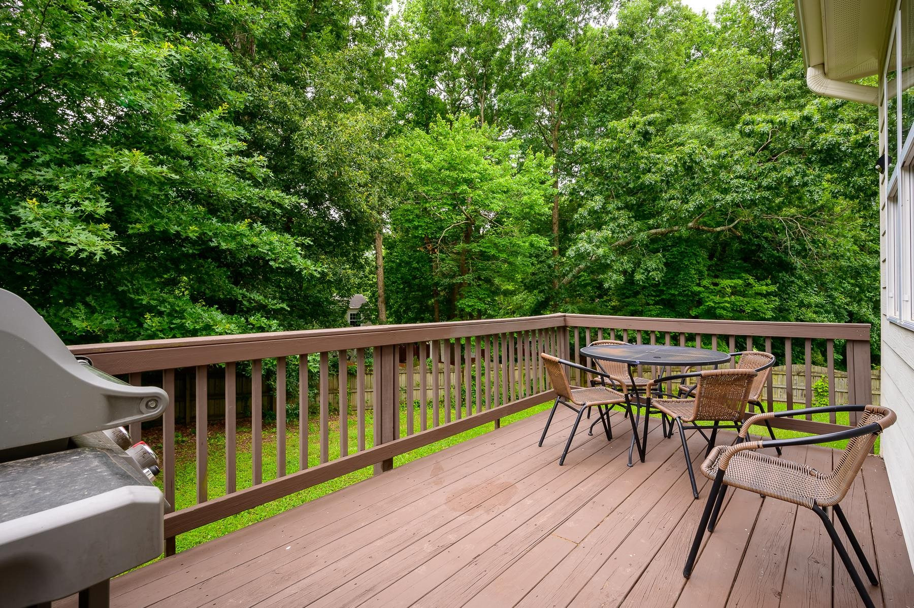 413 Mickey Lane Cary, NC 27513 - Photo 32 of 35 a view of a balcony with chairs