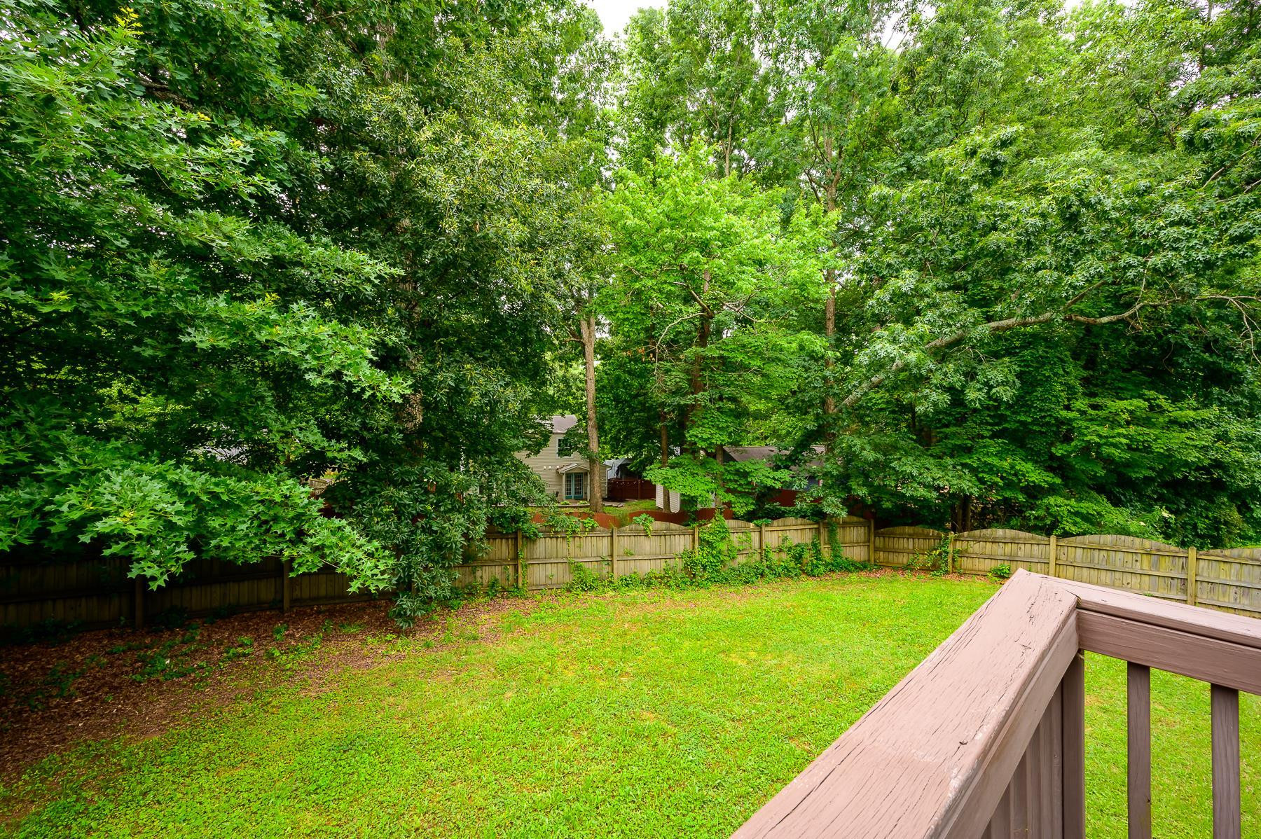 413 Mickey Lane Cary, NC 27513 - Photo 34 of 35 a view of a backyard with swimming pool