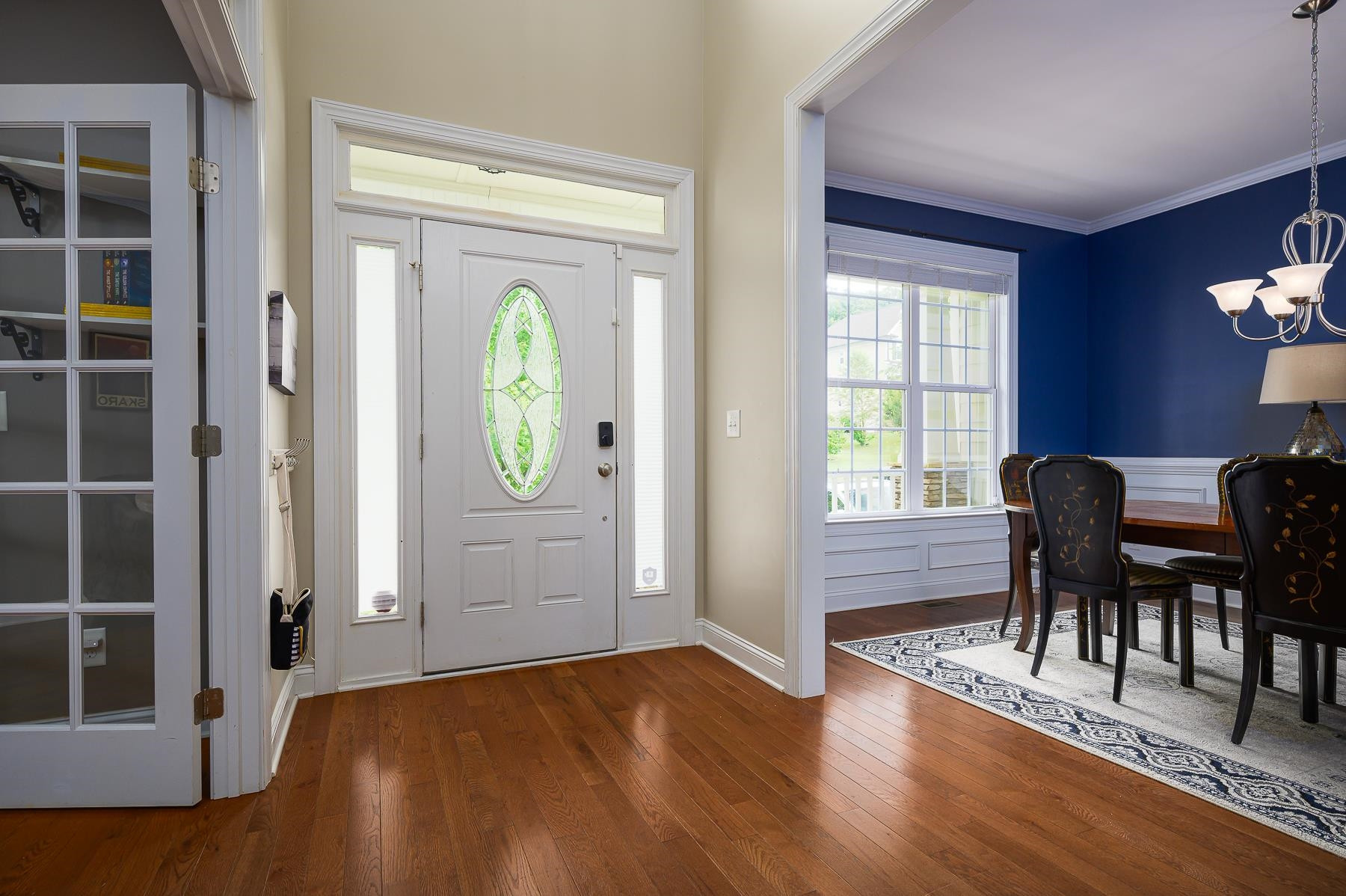 413 Mickey Lane Cary, NC 27513 - Photo 5 of 35 a view of a livingroom with furniture and wooden floor