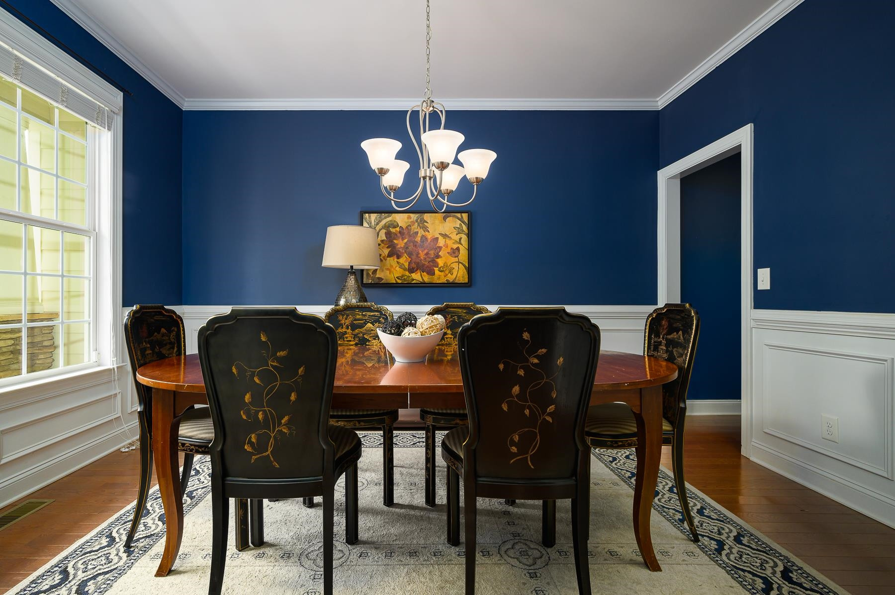 413 Mickey Lane Cary, NC 27513 - Photo 7 of 35 a view of a dining room with furniture and chandelier
