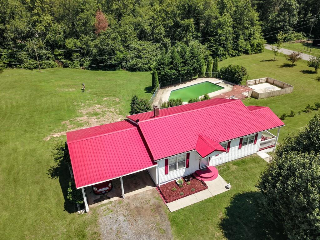 3015 Deal Mill Road Hudson, NC 28638 - Photo 2 of 34 an aerial view of a pool patio fire pit and outdoor seating