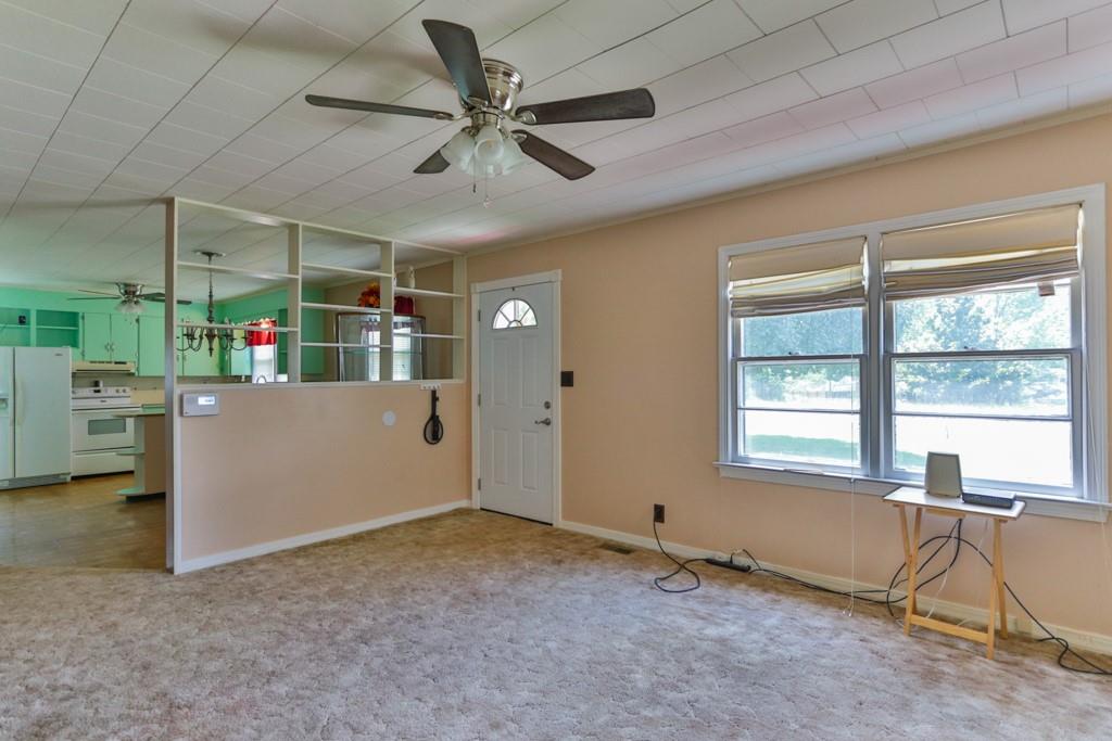 3015 Deal Mill Road Hudson, NC 28638 - Photo 17 of 34 a view of a livingroom with furniture and a window