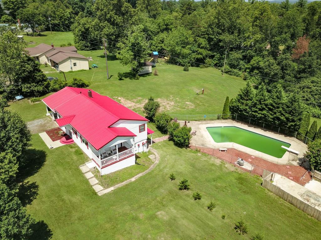 3015 Deal Mill Road Hudson, NC 28638 - Photo 3 of 34 an aerial view of a pool