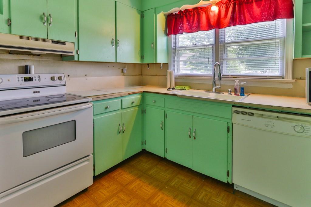 3015 Deal Mill Road Hudson, NC 28638 - Photo 21 of 34 a kitchen with a sink cabinets and window
