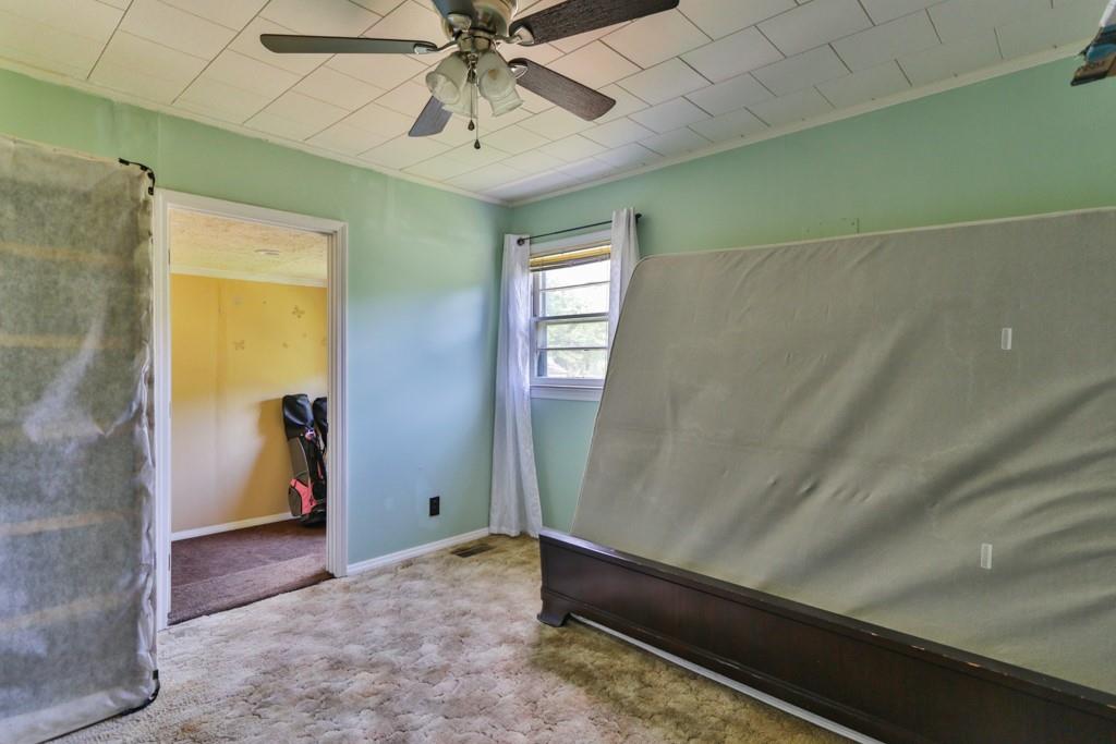 3015 Deal Mill Road Hudson, NC 28638 - Photo 25 of 34 a view of room with window and stairs
