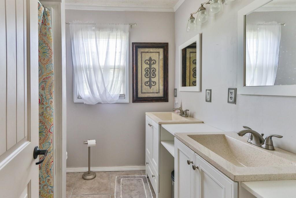 3015 Deal Mill Road Hudson, NC 28638 - Photo 28 of 34 a bathroom with a sink and a mirror