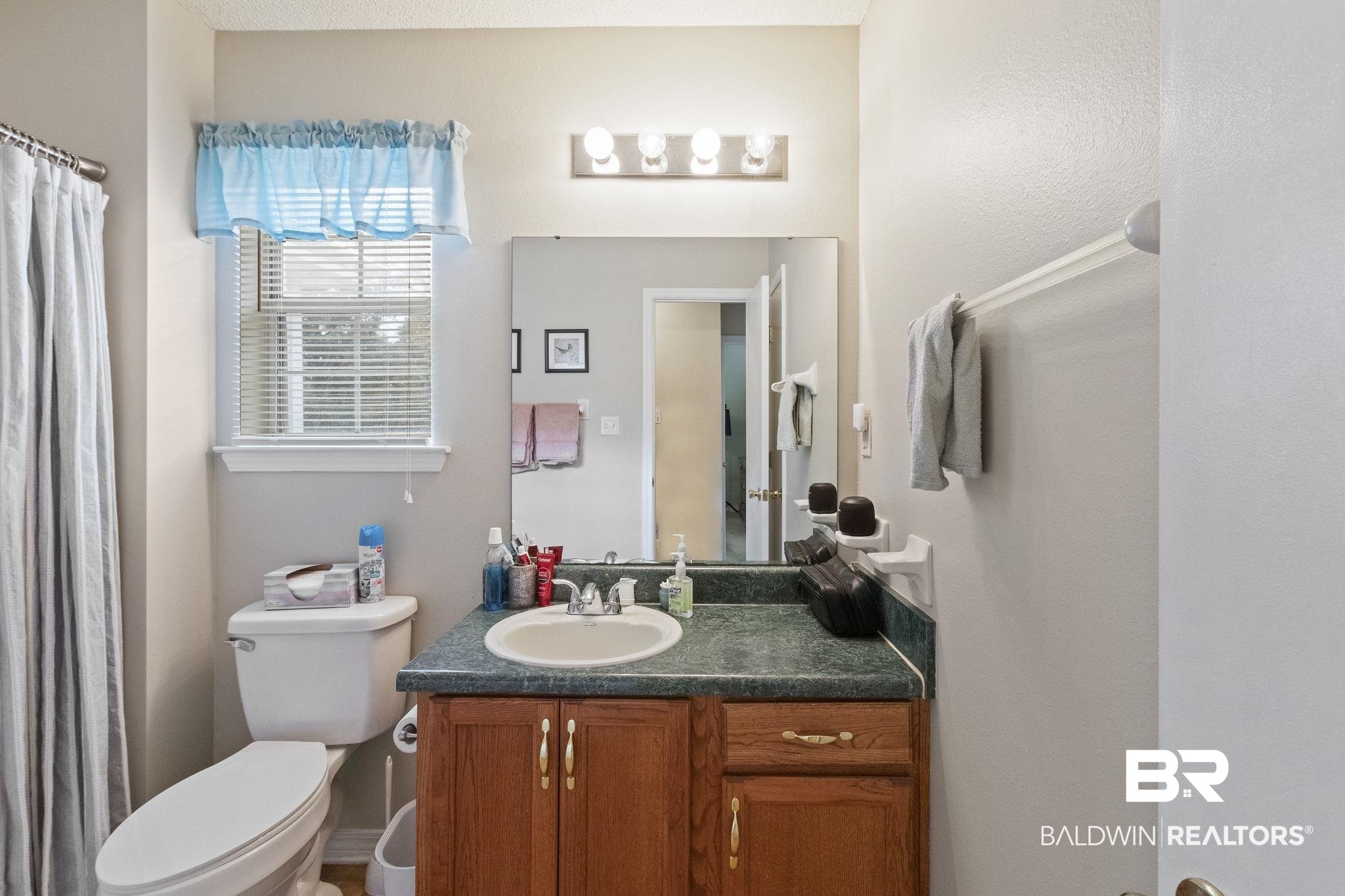 14031 Brook Hollow Road Summerdale, AL 36580 - Photo 38 of 56 Bathroom with vanity and toilet