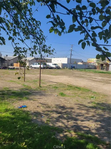 a view of a street with an outdoor space