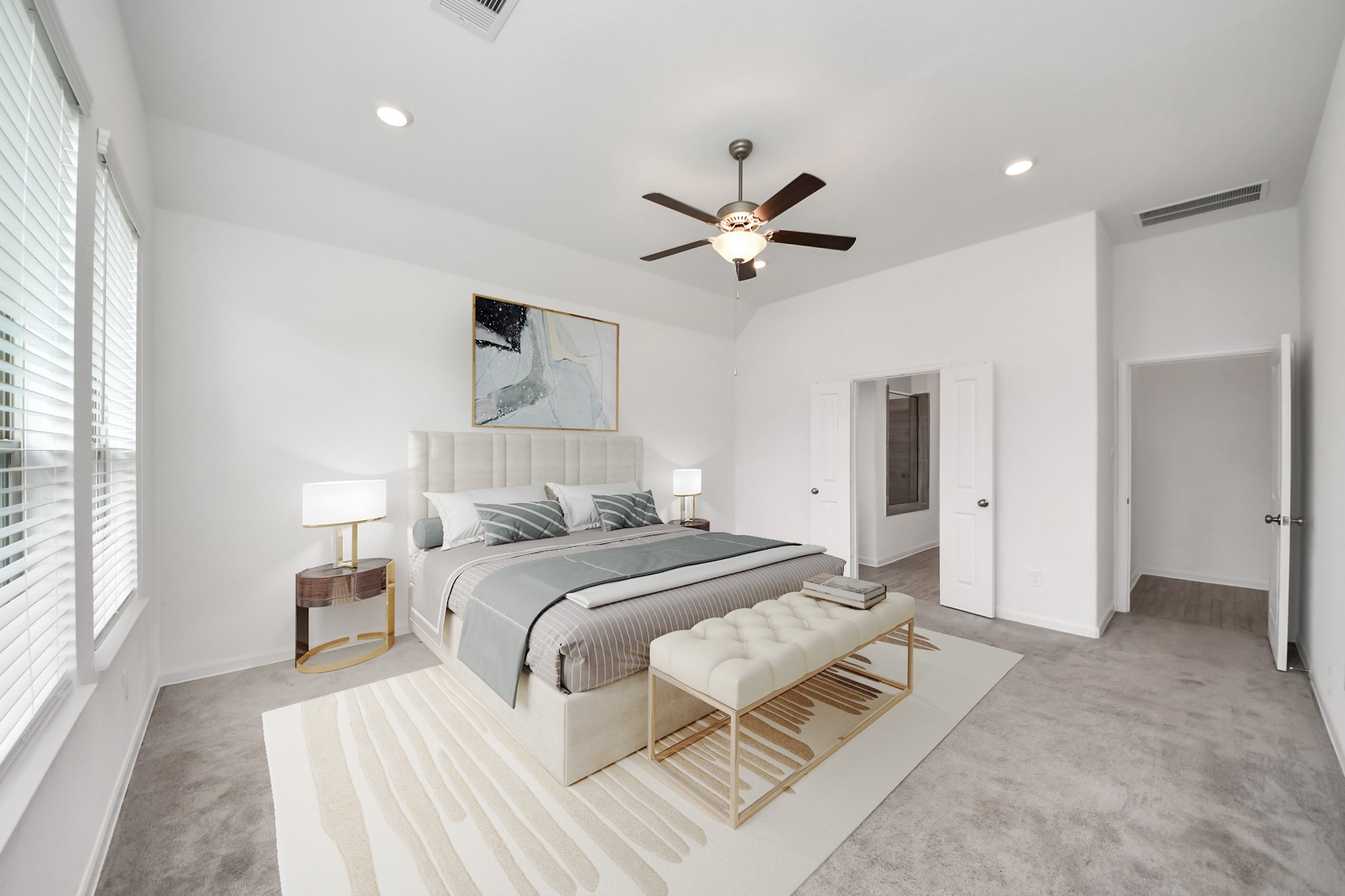 17770 Misty Brook Lane Conroe, TX 77302 - Photo 20 of 50 a bedroom with a large bed and a ceiling fan