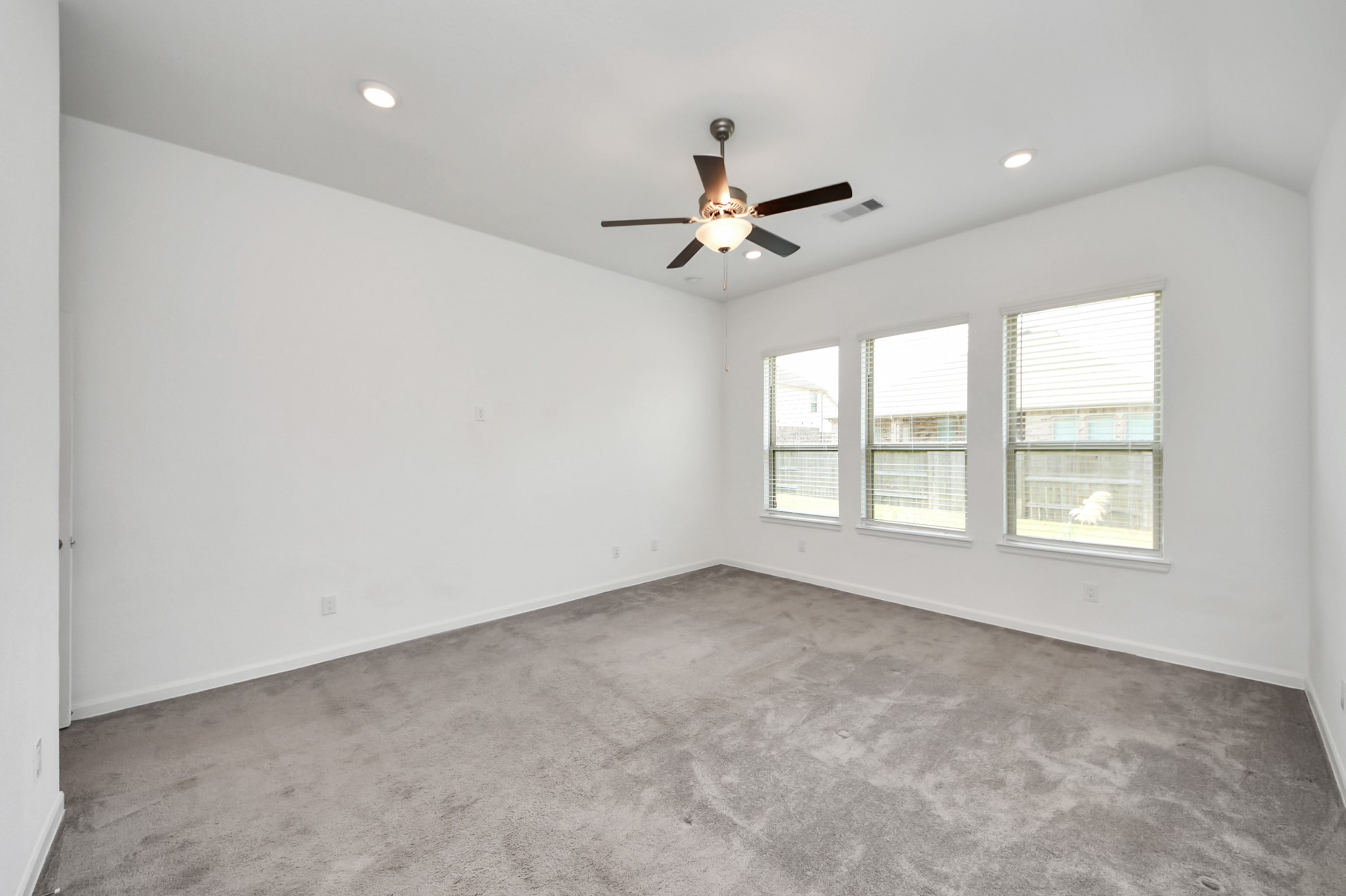 17770 Misty Brook Lane Conroe, TX 77302 - Photo 22 of 50 a view of an empty room with a window