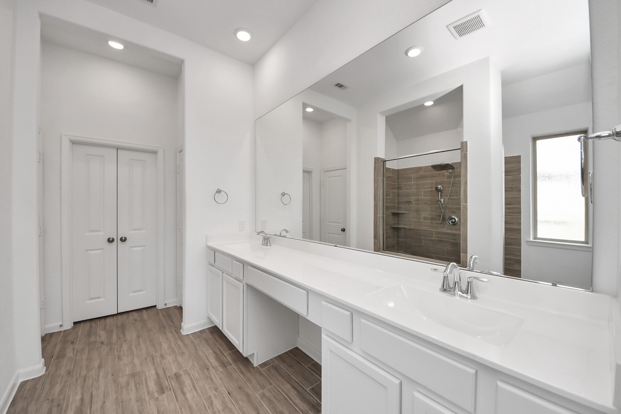 17770 Misty Brook Lane Conroe, TX 77302 - Photo 26 of 50 a bathroom with a sink and a mirror