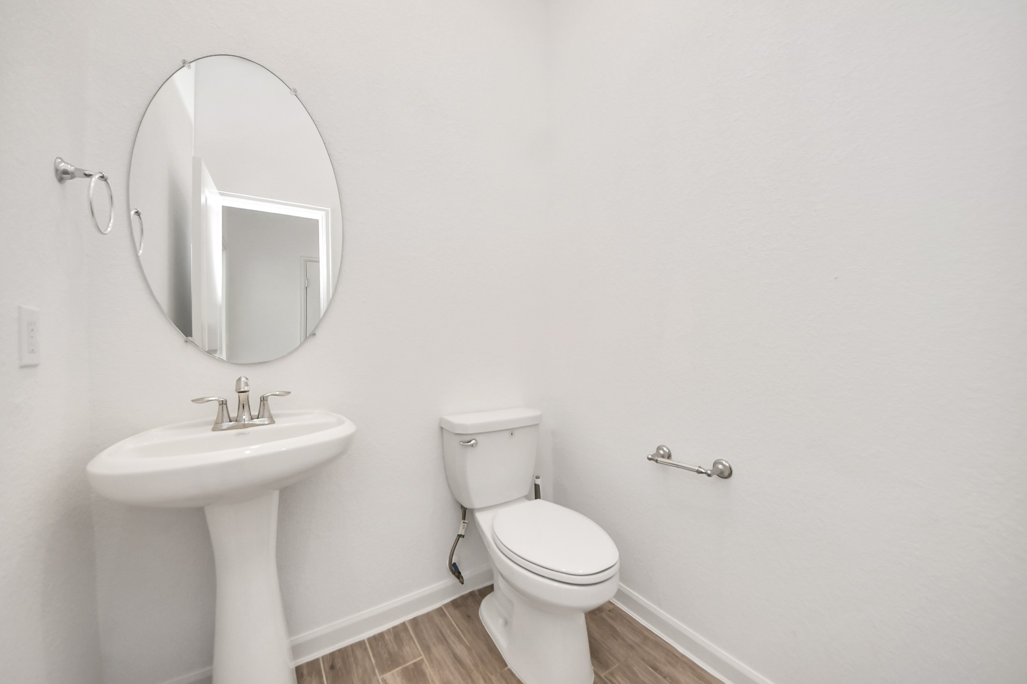 17770 Misty Brook Lane Conroe, TX 77302 - Photo 28 of 50 a bathroom with a sink toilet and a mirror