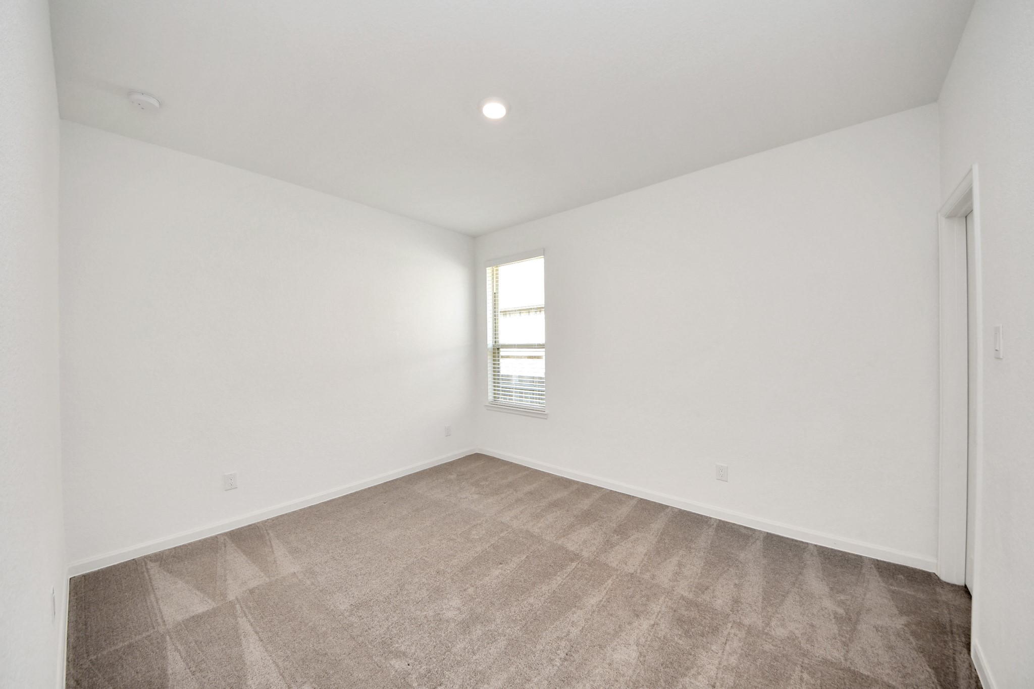 17770 Misty Brook Lane Conroe, TX 77302 - Photo 31 of 50 a view of an empty room with a window