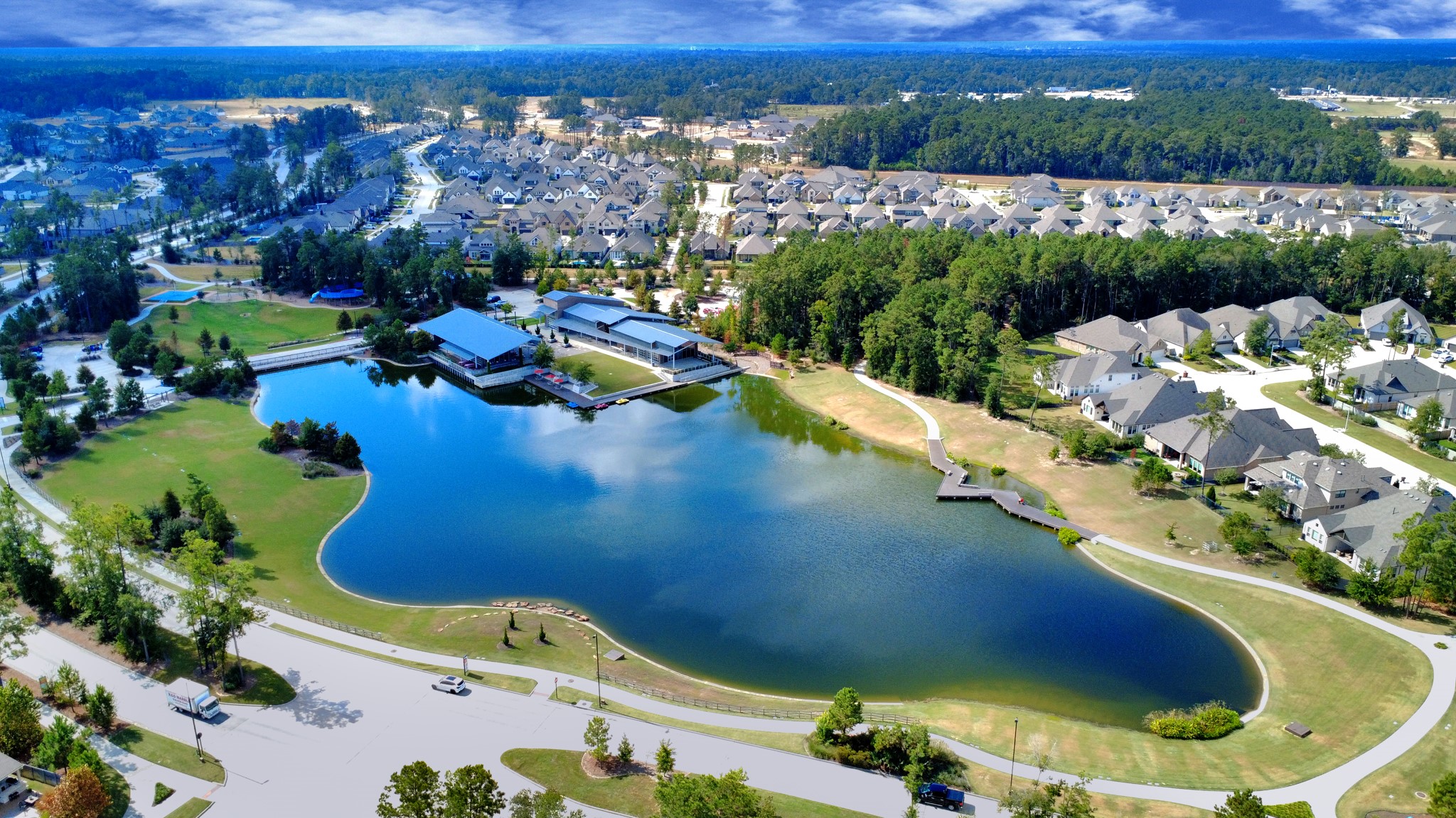 17770 Misty Brook Lane Conroe, TX 77302 - Photo 4 of 50 a view of a swimming pool with a yard