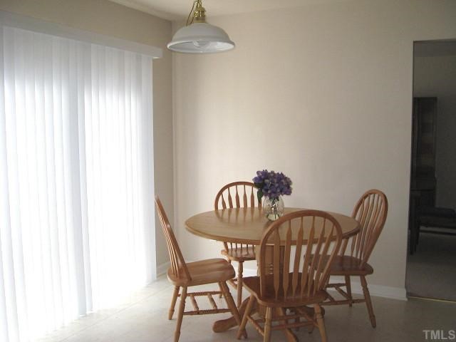 5251 Little Sandy Drive Raleigh, NC 27616 - Photo 5 of 12 Bright breakfast area with access to deck