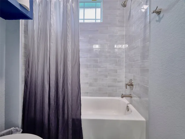 a bathroom with a bathtub