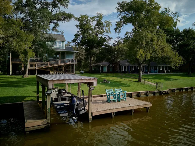 a view of a lake with a house in the background