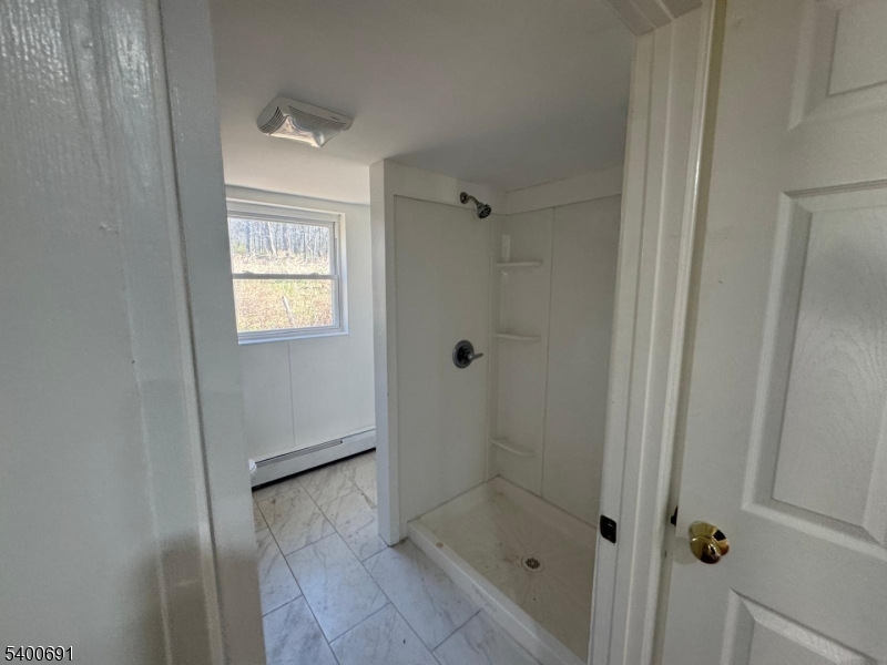 22 Spring Lane Long Valley, NJ 07853 - Photo 12 of 12 a bathroom with a shower