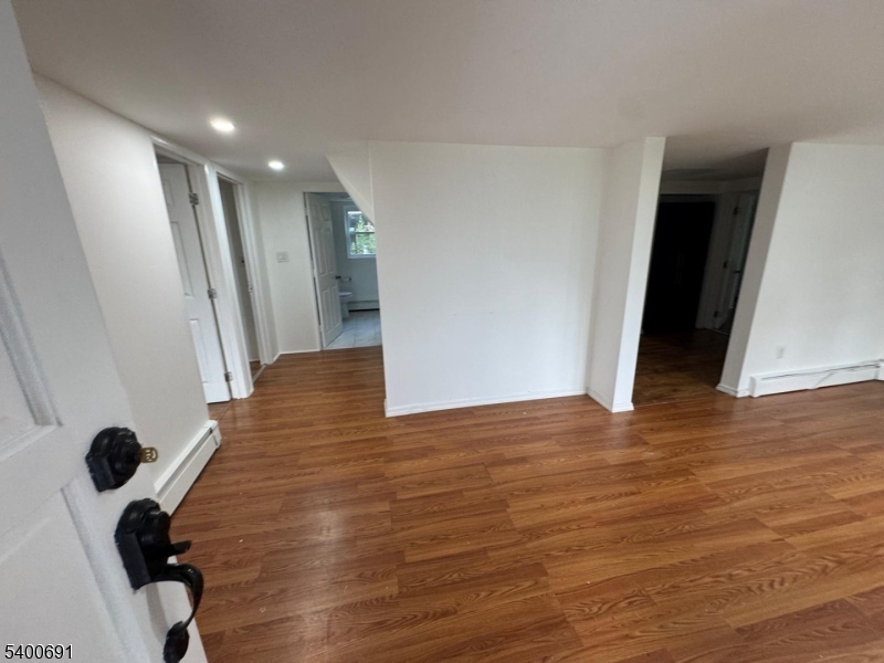 22 Spring Lane Long Valley, NJ 07853 - Photo 5 of 12 a view of entryway with wooden floor