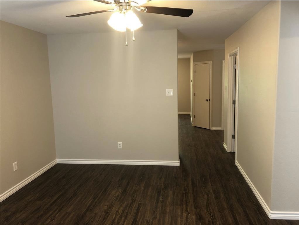 212 Gulf Pump Road, Unit C Crosby, TX 77532 - Photo 8 of 14 a view of a hallway with wooden floor