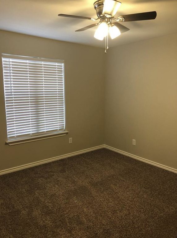 212 Gulf Pump Road, Unit C Crosby, TX 77532 - Photo 10 of 14 an empty room with a window