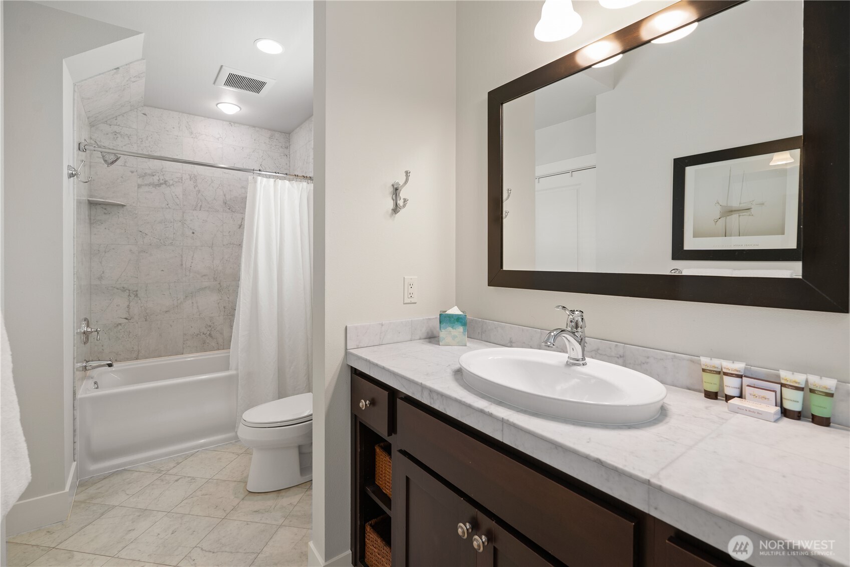 12 Cobblestone Lane Friday Harbor, WA 98250 - Photo 9 of 17 a bathroom with a granite countertop sink toilet and shower