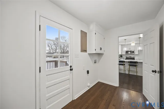 a view of kitchen with wooden floor