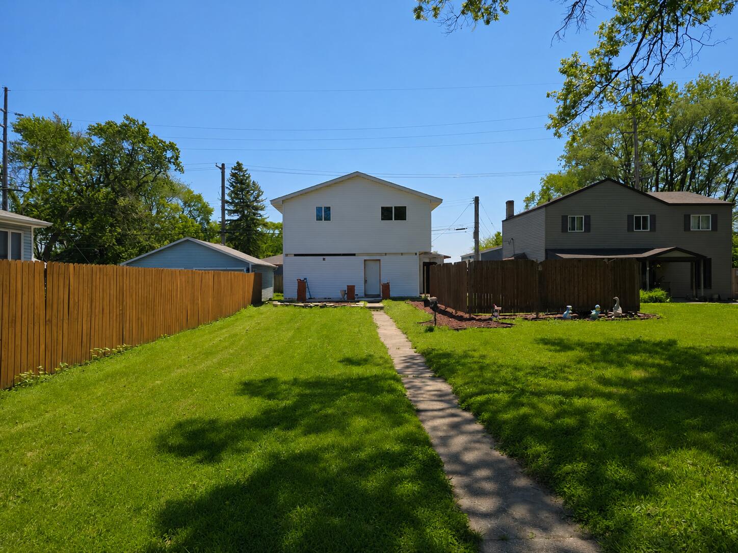 426 Cherry Street Hammond, IN 46324 - Photo 2 of 6 a house view with a garden space
