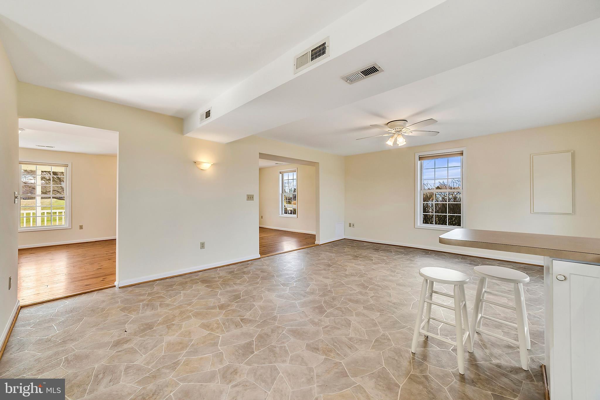 9863 Meetze Road Midland, VA 22728 - Photo 16 of 29 Kitchen looking out to dining and living rooms