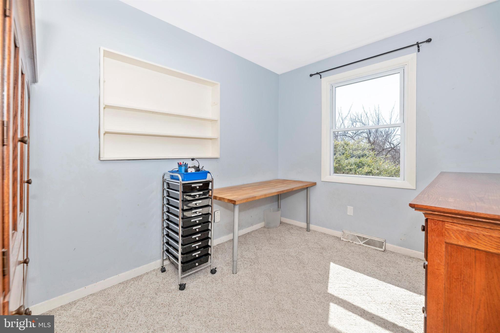 20824 Netz Road Boonsboro, MD 21713 - Photo 11 of 53 a room that has a window and a table in it