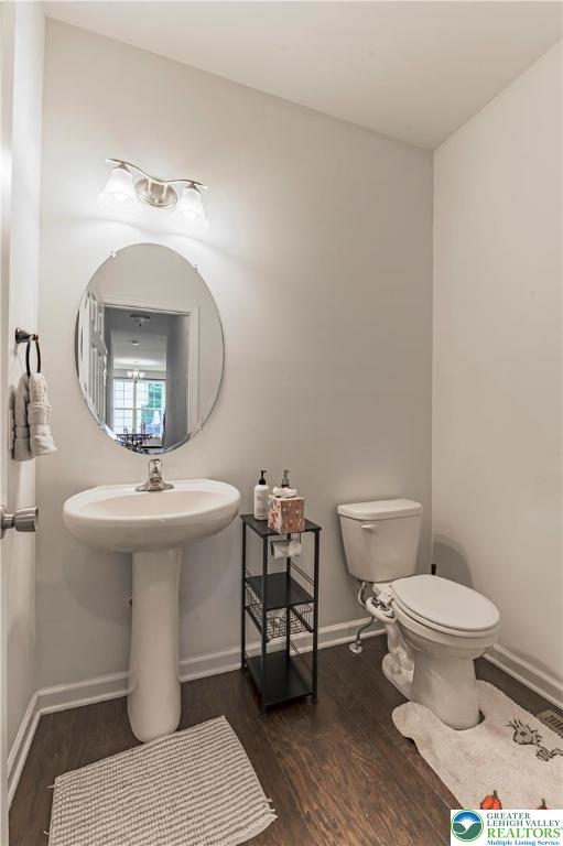 3892 Mink Road Emmaus, PA 18049 - Photo 14 of 39 a bathroom with a sink toilet and a mirror