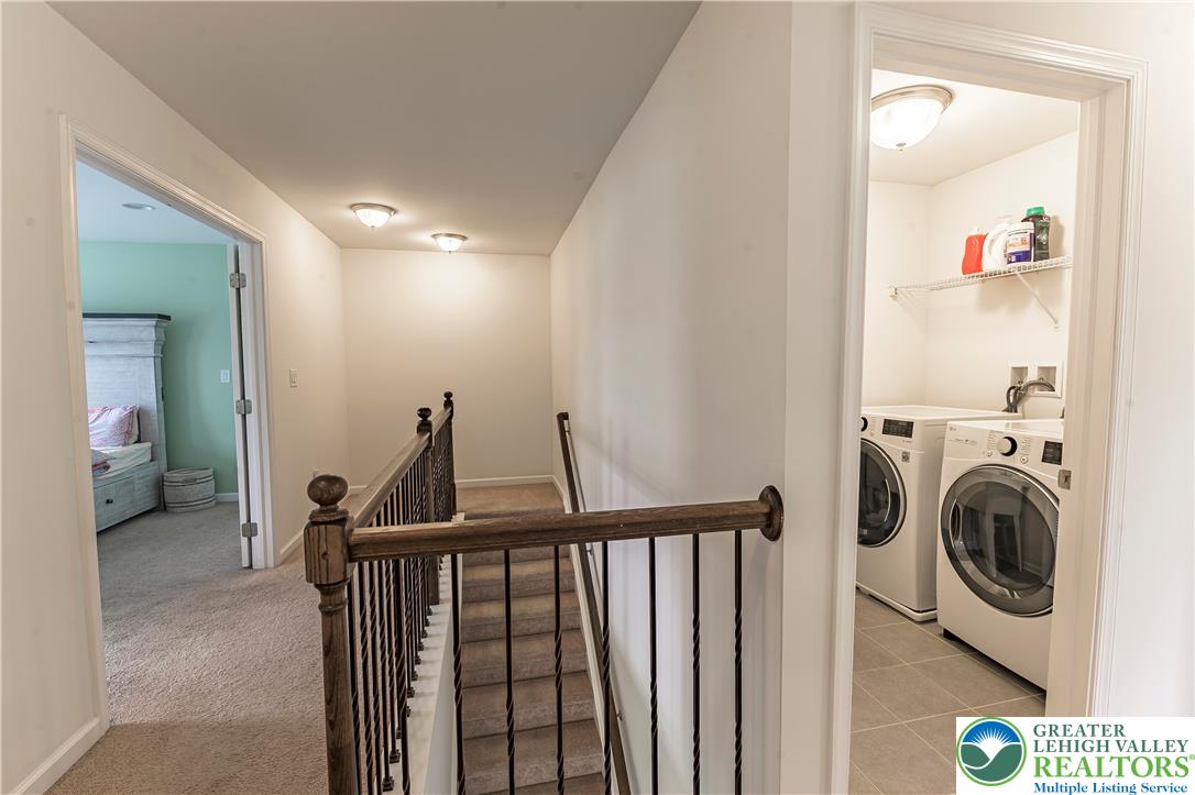 3892 Mink Road Emmaus, PA 18049 - Photo 15 of 39 a view of a hallway with washer and dryer