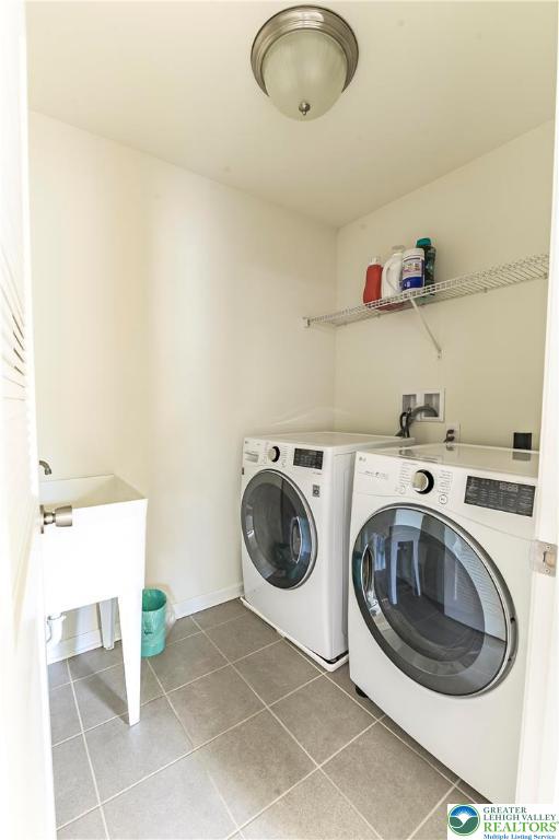 3892 Mink Road Emmaus, PA 18049 - Photo 16 of 39 a utility room with sink dryer and washer
