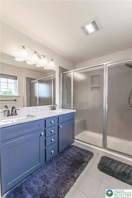 3892 Mink Road Emmaus, PA 18049 - Photo 22 of 39 a bathroom with a granite countertop sink mirror toilet shower and bathtub
