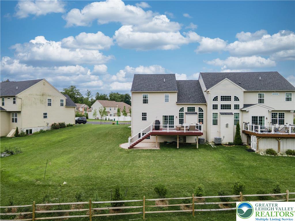 3892 Mink Road Emmaus, PA 18049 - Photo 31 of 39 a aerial view of a house with a garden and houses