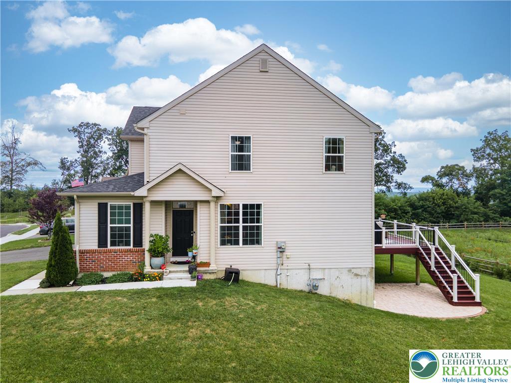 3892 Mink Road Emmaus, PA 18049 - Photo 35 of 39 a view of a house with a yard