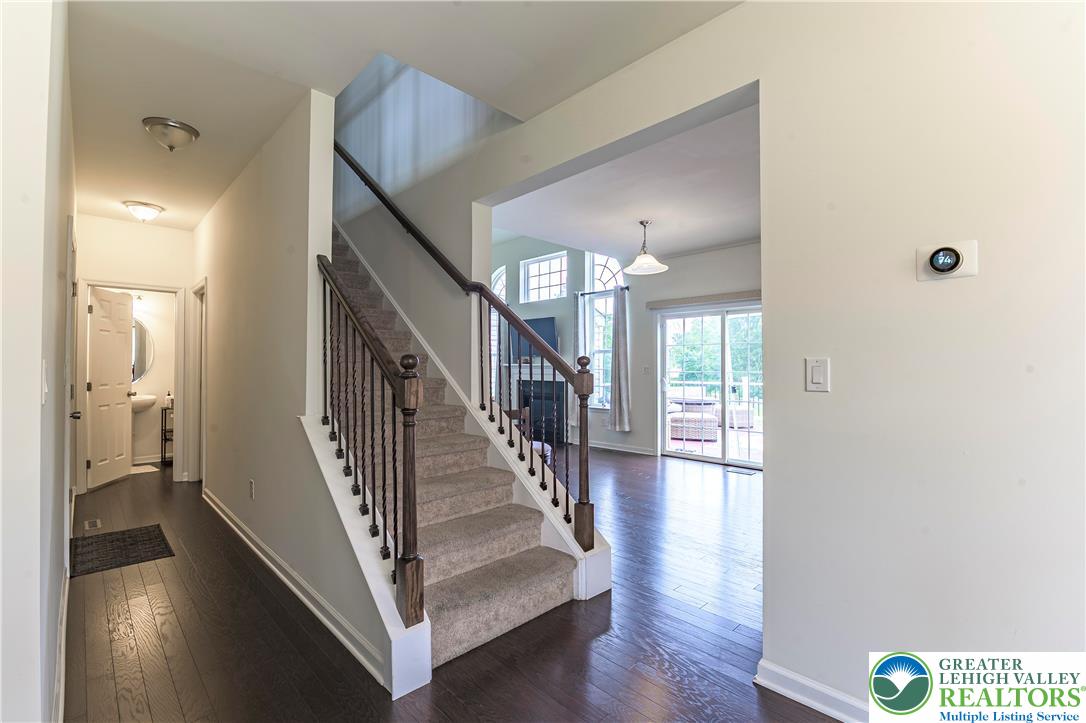 3892 Mink Road Emmaus, PA 18049 - Photo 7 of 39 a view of entryway and hall with wooden floor