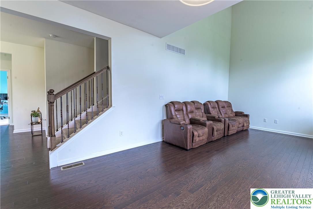 3892 Mink Road Emmaus, PA 18049 - Photo 8 of 39 a living room with furniture and stairs