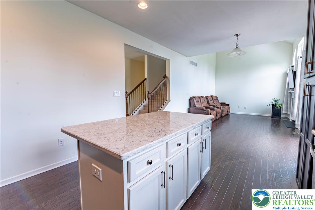 3892 Mink Road Emmaus, PA 18049 - Photo 10 of 39 a kitchen with a sink stove and wooden floor