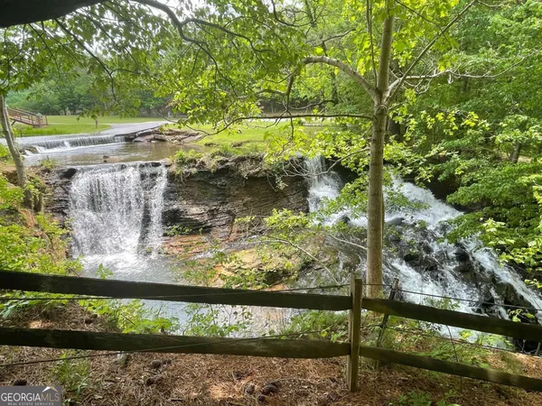 a view of a lake from a balcony