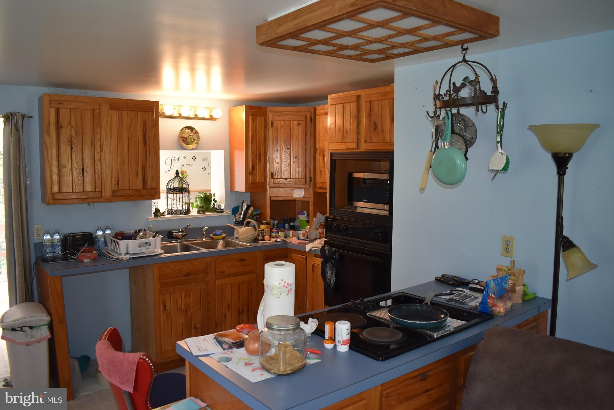 1971 Duckwall Road Berkeley Springs, WV 25411 - Photo 17 of 64 a kitchen with a sink stove and refrigerator