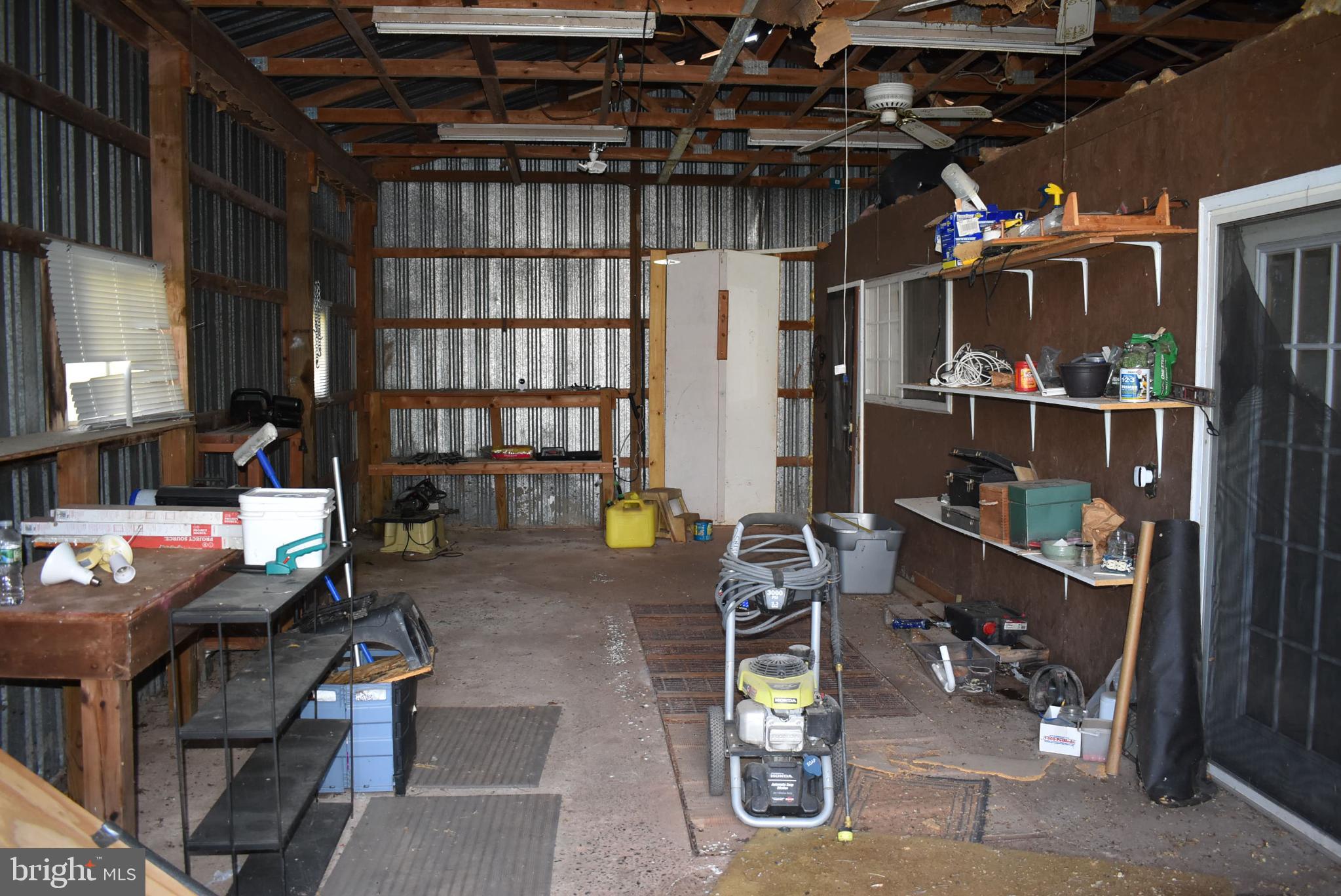 1971 Duckwall Road Berkeley Springs, WV 25411 - Photo 18 of 64 a view of store room with window